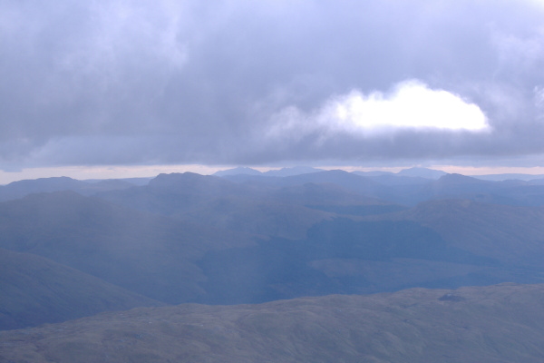 photograph of Arran just visble through the cloud 