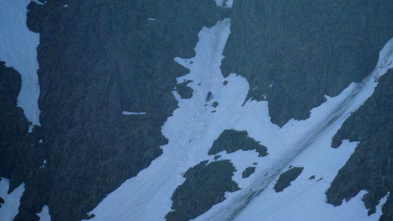  a climber on his way up a snowfield 