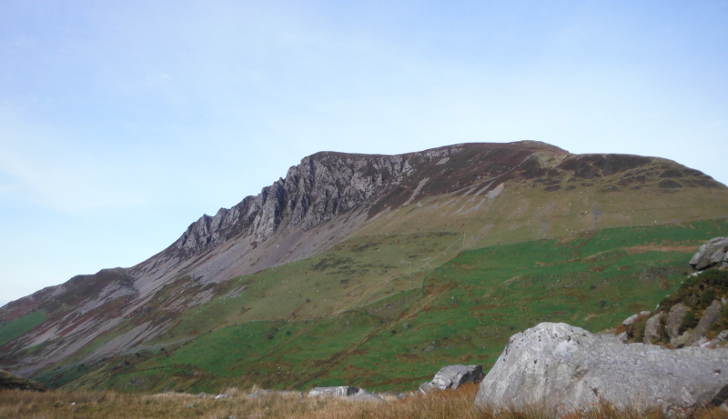  looking up to the crags of Craig Y Bera 