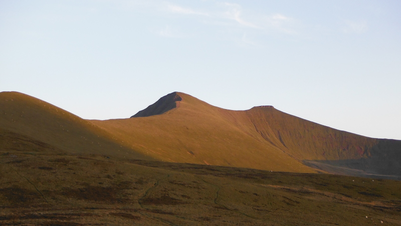  the sun lighting up Pen y Fan and Corn Du 