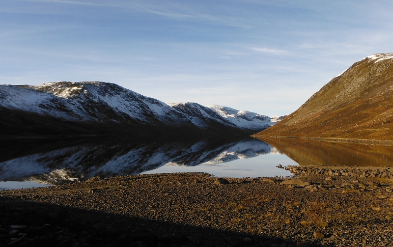  looking up Loch Turret, with the mountains reflected in the water 