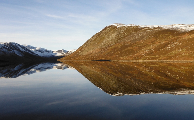  looking up Loch Turret, with the mountains reflected in the water 