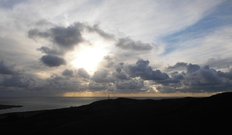  the sun trying to shine through the clouds 