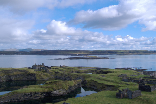 photograph of Fladda with Luing in the background 