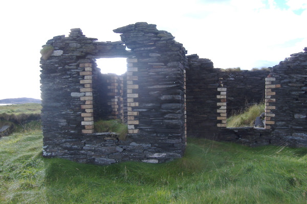 photograph of a building using brick as well as slate