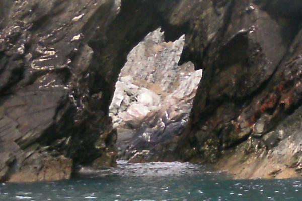 photograph of the boulder in the arch 