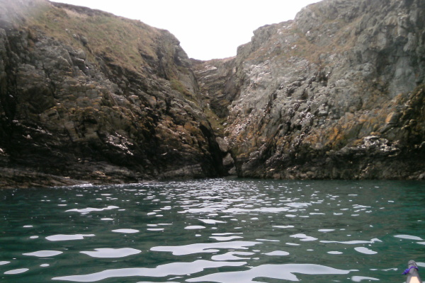 photograph of the coastline between Porth Rhwydau along to Dinas Stack 