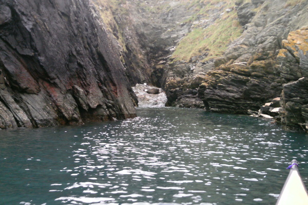 photograph of the coastline between Porth Rhwydau along to Dinas Stack 