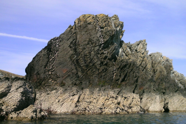 photograph of a particular rock feature at Penrhyn Mawr at low tide 