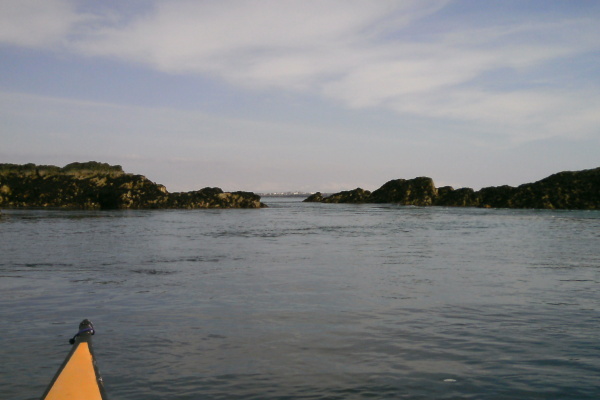 photograph of a channel through the rocks at Penrhyn Mawr at low tide 