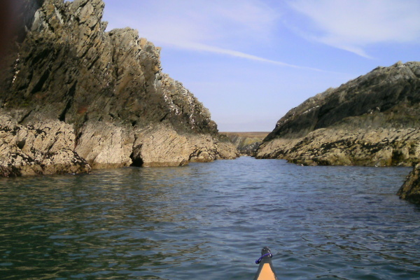 photograph of the channel through the rocks at Penrhyn Mawr at low tide 