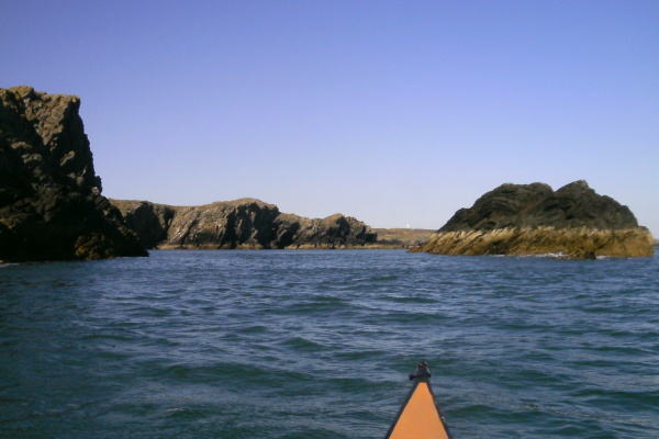 photograph of the next headland framed by Dinas Stack and Gul Rock 