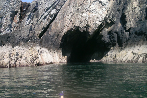 photograph looking into the cave from the open water 