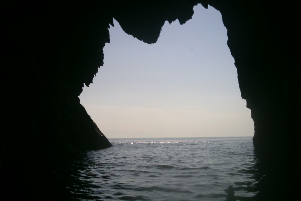 photograph looking out of the cave 