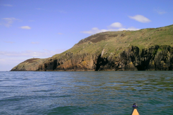 photograph looking across to headland three and the caves 