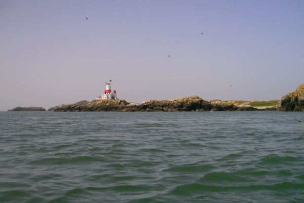 photograph looking out to the lighthouse on the Skerries 