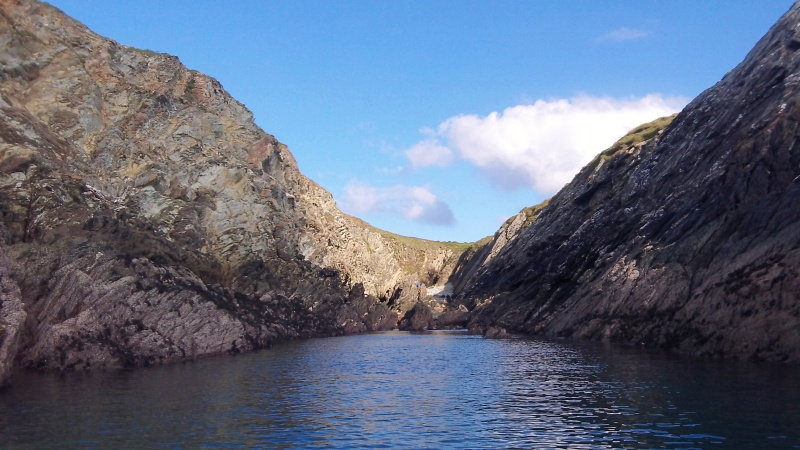 photograph of a steeply sided rocky cove  