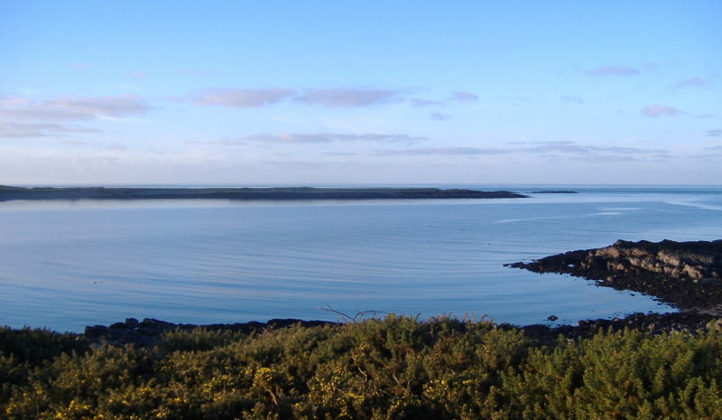 the long low spit of land that ends in Cemlyn Point  