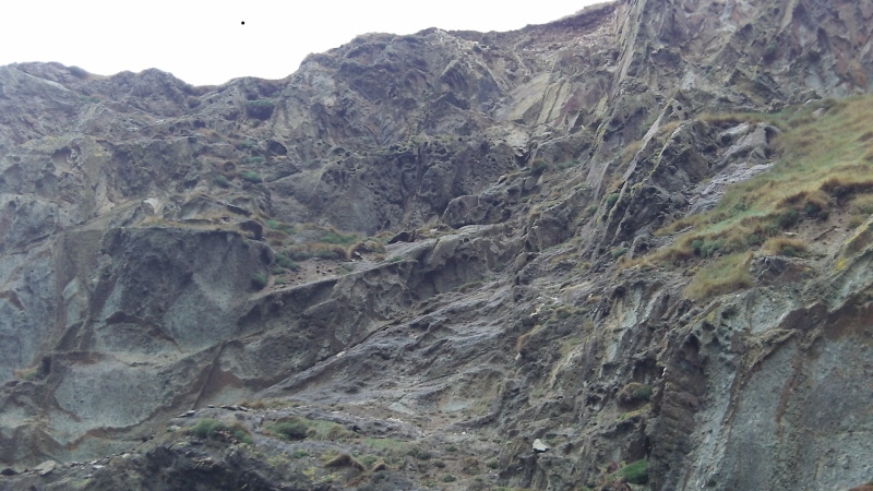 weathered rock high up the cliff 