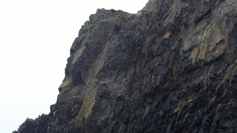 weathered rock high up on the cliff 