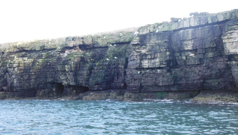 the heavily layered cliffs 