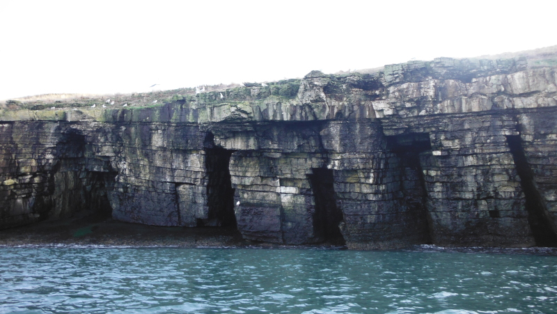 the heavily layered cliffs 