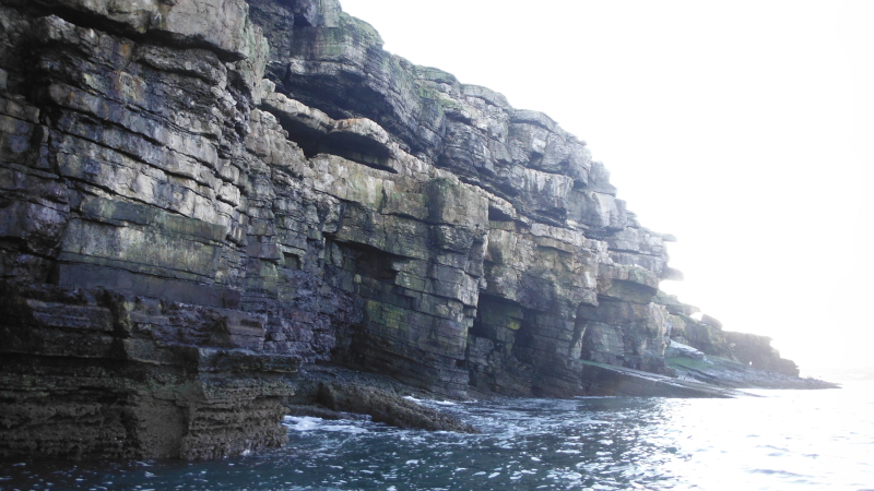 the heavily layered cliffs 