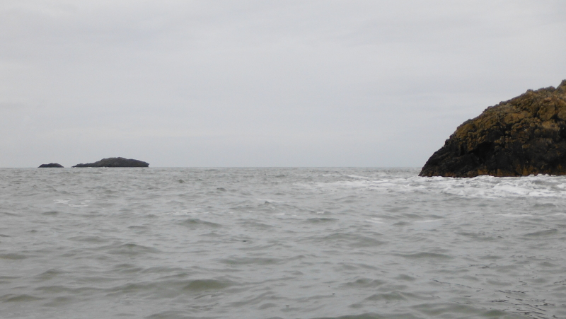 looking past Llanbadrig Head to Middle Mouse 