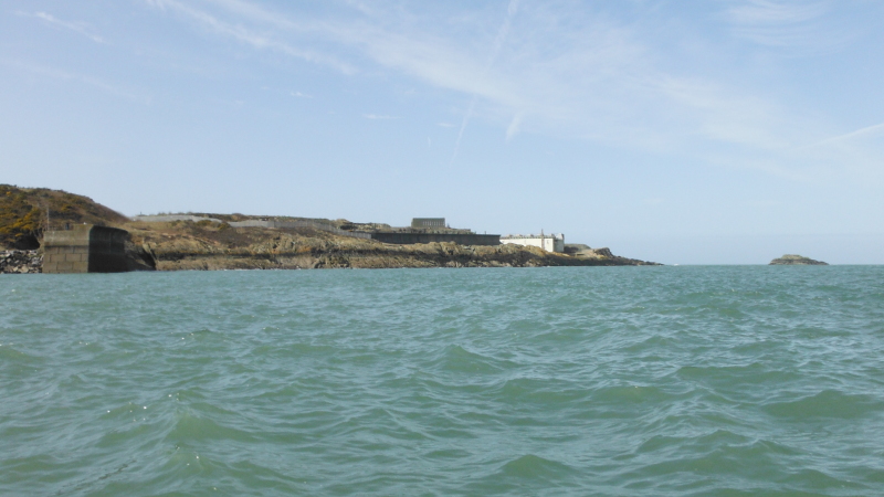  looking across the entrance to Amlwch harbour at the industrial site and East Mouse  