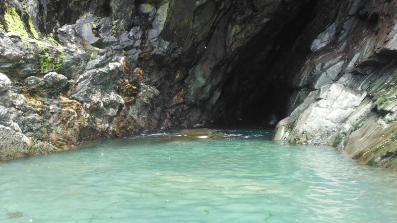  the rock in the entrance to the cave  