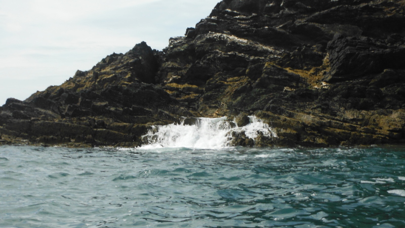  the water pouring over the rocks  