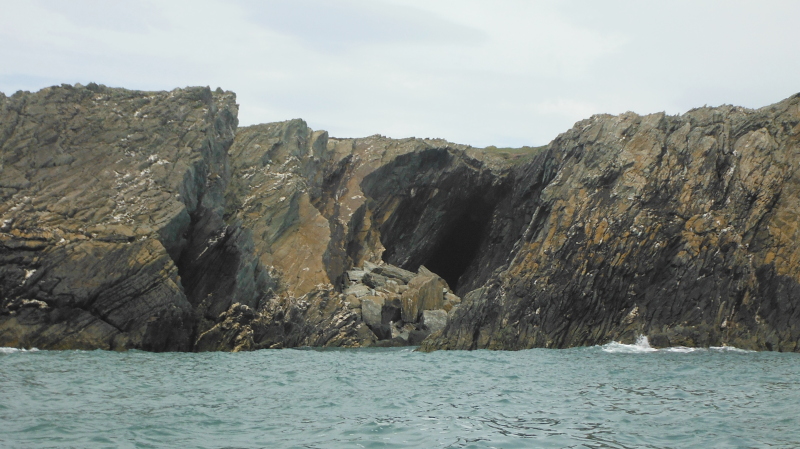  the rockfall at the entrance to a bit of a cave  