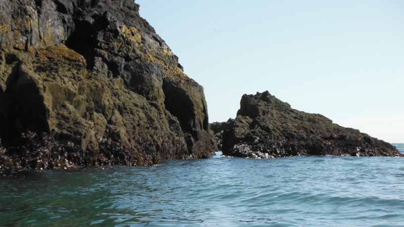  the narrow channel between the rocks 