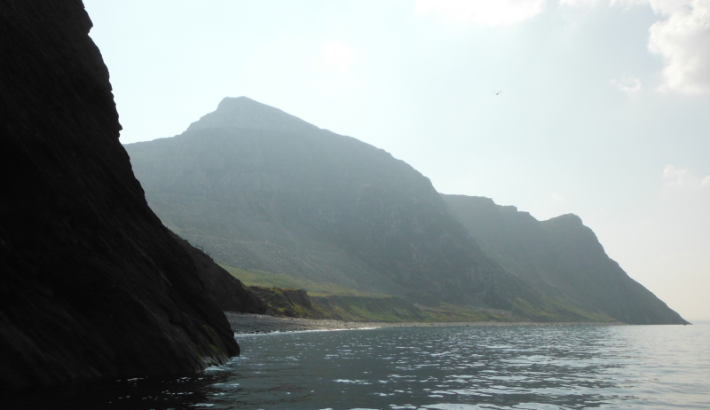  looking along the stoney beach to the next headland, Trwyn y Gorlech 