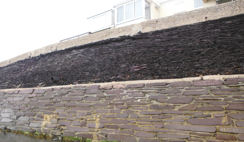  part of the seawall made out of slate  