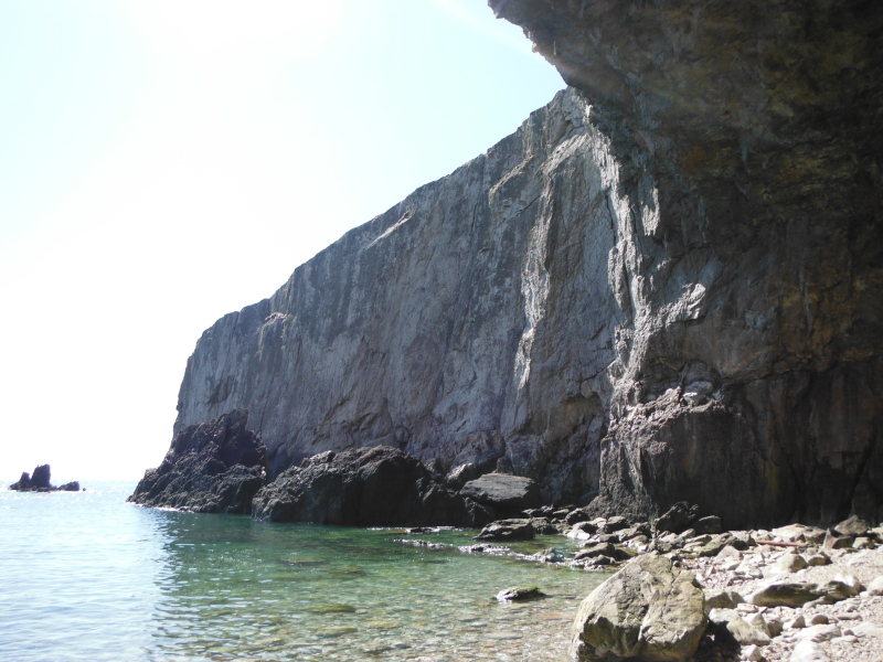 the rock wall beside Parliament Cave 