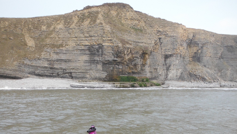  the natural pavement at the base of the cliffs 