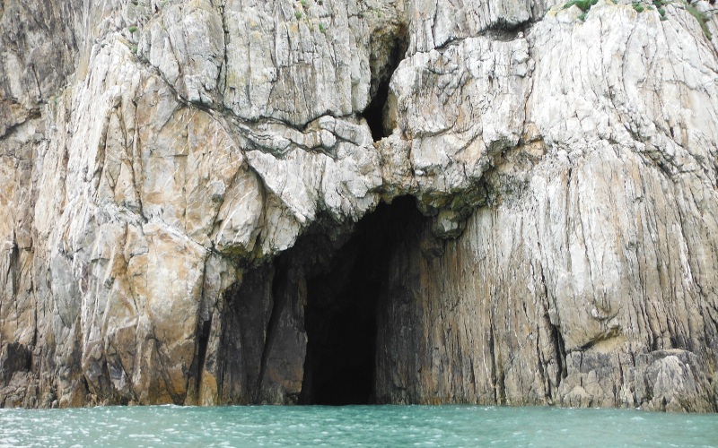  the outside of the cave with a window 