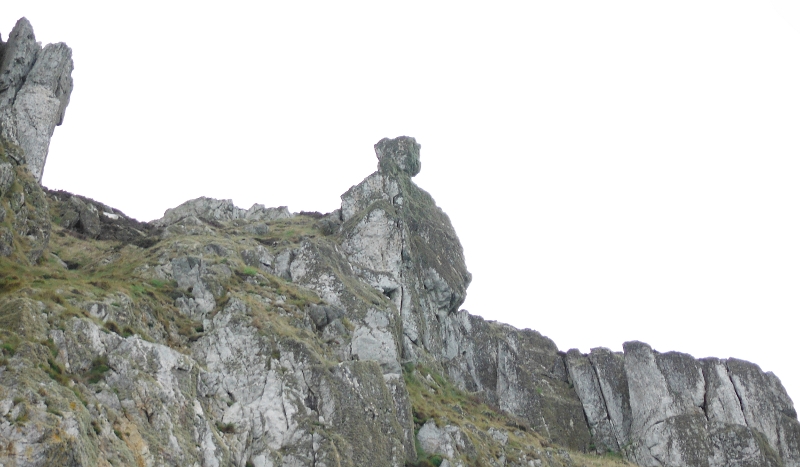  the boulder sitting on top of the tower 