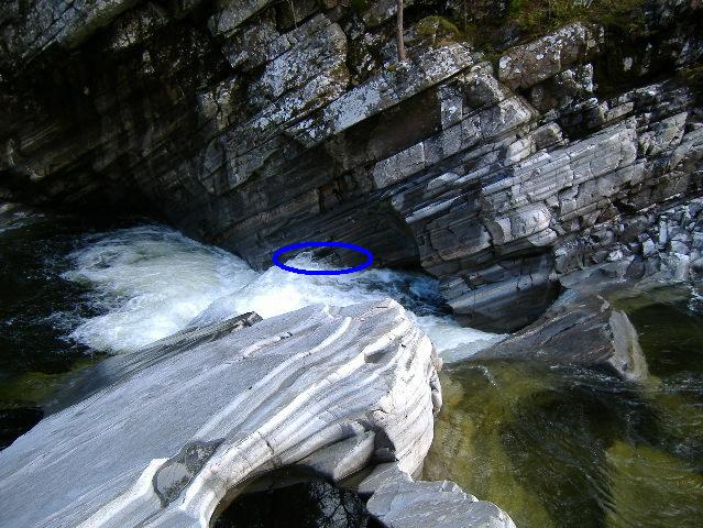 photograph of the rock wall where the boat was pinned