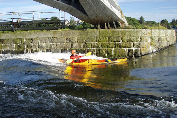 photograph of Ron on the main wave in a Romany Surf RM