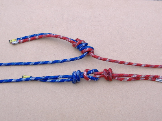 photograph of a reef knot, with double stopper knots, beside a double overhand knot