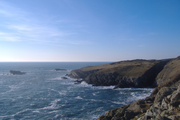 photograph looking north west along the coastline towards Rhoscolyn Head 