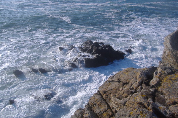 photograph looking south east along the coastline towards Rhoscolyn bay 