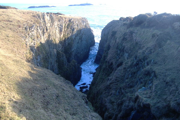 photograph looking down into one of the slots in the coastline 