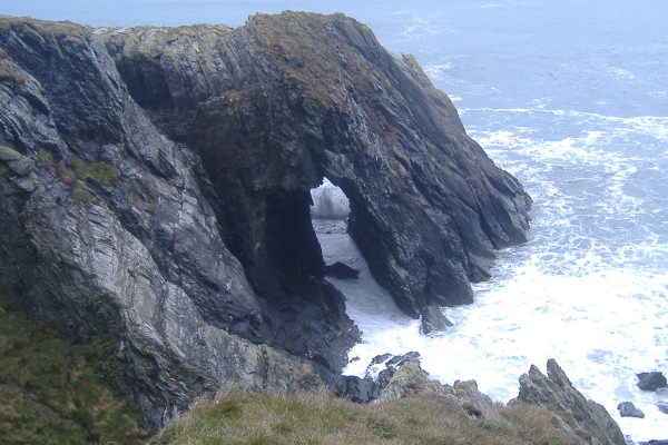 photograph of the hole through the rocks 