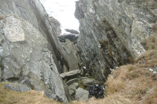 photograph looking down into one of the deep cuts into the cliffs  