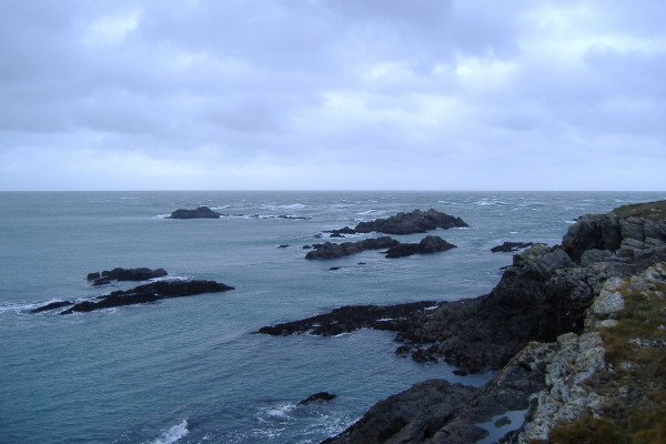 photograph of the rocks at Penrhyn Mawr during a flood tide 