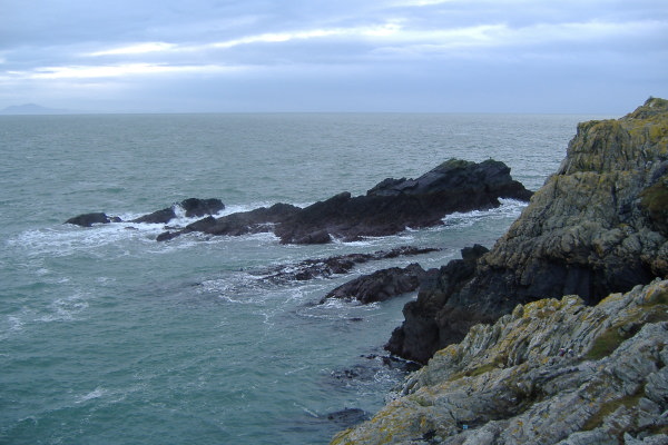 photograph of rock shoal off the headland 