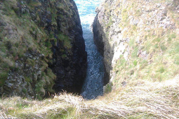 photograph of the deep slot right beside the path 